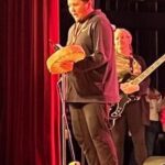 OIMC youth John Jay sings a tribal song at VERITAS