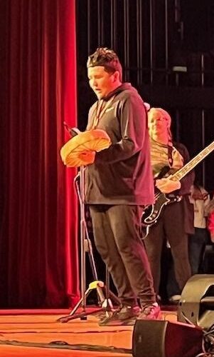 OIMC youth John Jay sings a tribal song at VERITAS